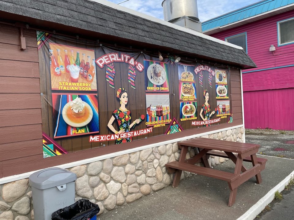 Simple diner tables inside a Mexican restaurant.